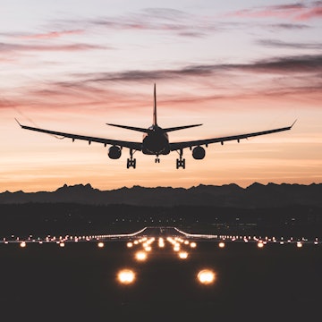 An airplane moments from touching down on the runway at sunrise.
1303030943
Aircraft landing at sunrise - stock photo
An airplane moments from touching down on the runway at sunrise.