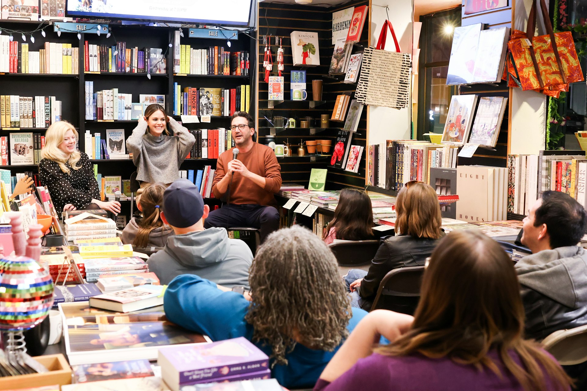Authors speak during a reading inside the bookstore Book Soup, West Hollywood, California, USA