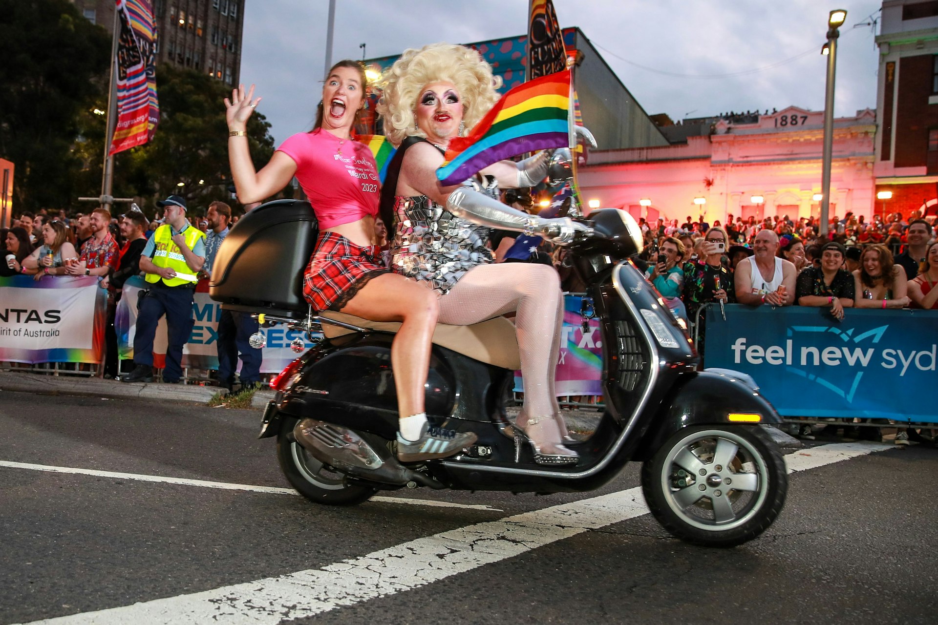 A drag queen and passenger on a motorcycle at Sydney Gay & Lesbian Mardi Gras, Sydney, New South Wales, Australia