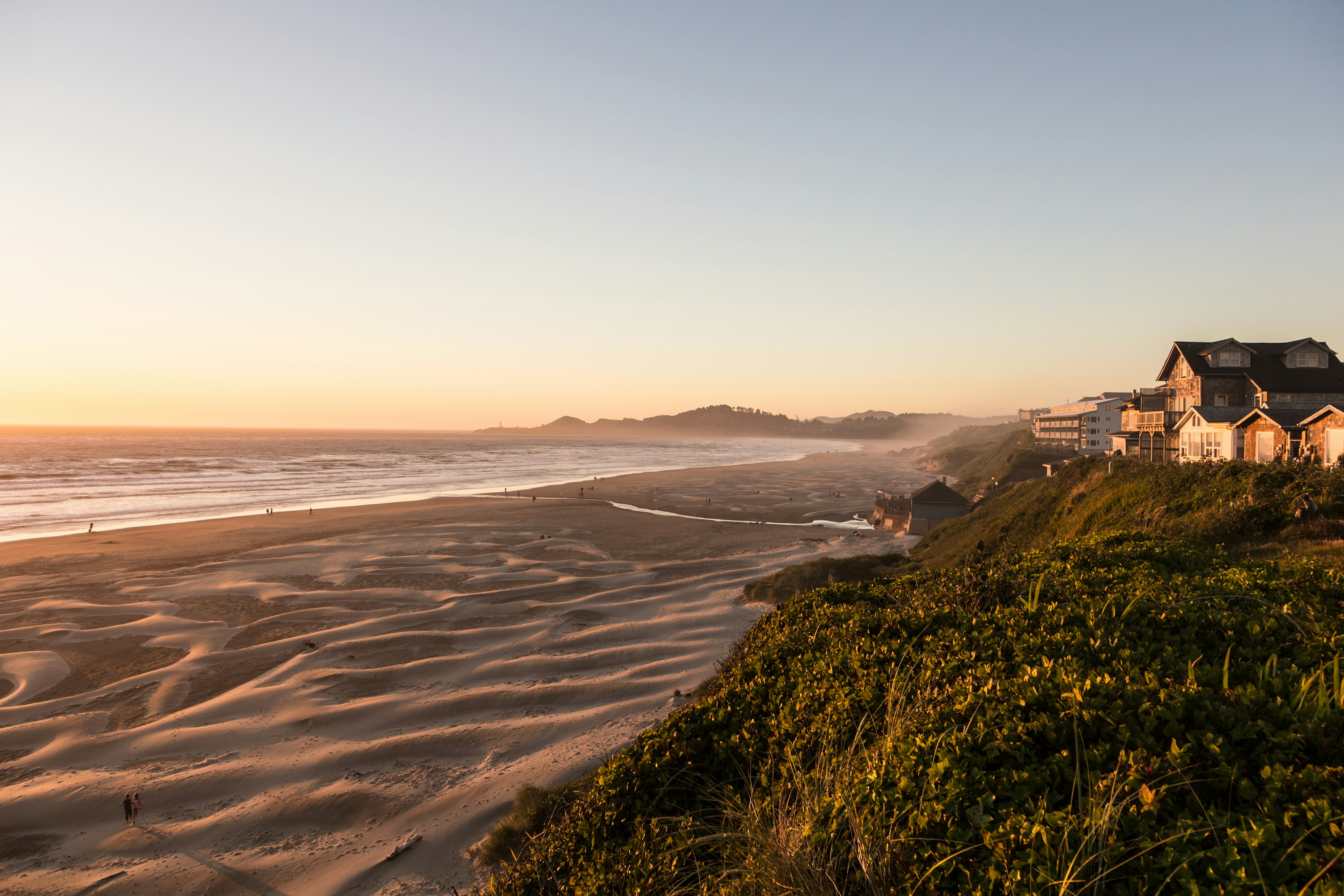 Sunset over the beach and the Pacific ocean in Newport, a town along the 101 highway along the coast in Oregon, USA