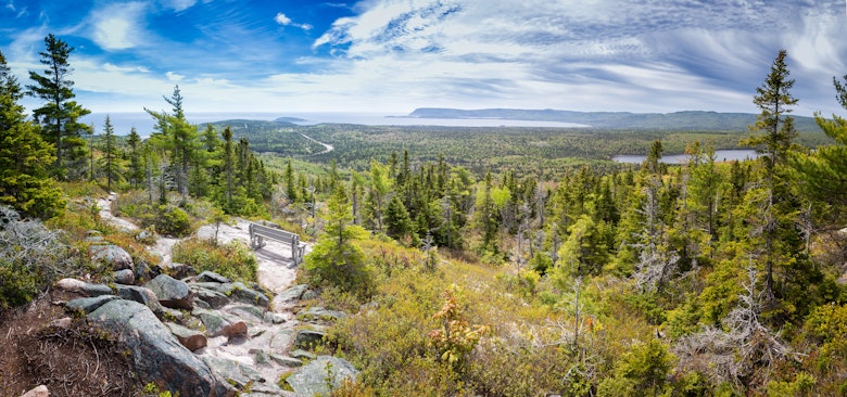 Panorama of Broad Cove Mountain in Cape Breton National Park.
1019638592
Sky, Blue, Hill, Tree, Cape Breton Island, Landscape - Scenery, broad cove mountain, Forest, Canada, Travel, Nature, Hiking, Cape Breton Highlands National Park, Tourism, Panoramic, Mountain, Horizontal, Cloudscape, Outdoors, Park Bench, No People, Scenics - Nature, Bench, Photography, Cloud - Sky, Nova Scotia, Green Color