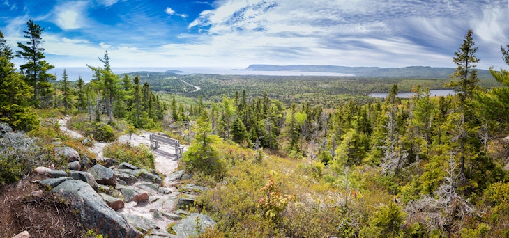 Panorama of Broad Cove Mountain in Cape Breton National Park.
1019638592
Sky, Blue, Hill, Tree, Cape Breton Island, Landscape - Scenery, broad cove mountain, Forest, Canada, Travel, Nature, Hiking, Cape Breton Highlands National Park, Tourism, Panoramic, Mountain, Horizontal, Cloudscape, Outdoors, Park Bench, No People, Scenics - Nature, Bench, Photography, Cloud - Sky, Nova Scotia, Green Color