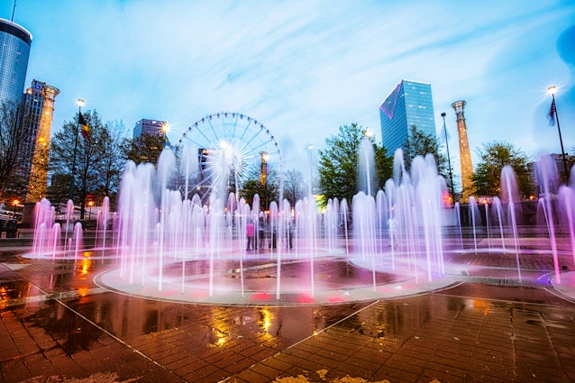 April 5, 2014: The colourfully lit fountain at Centennial Olympic Park with a Ferris wheel in the background.
486068945
Outdoors, Nightlife, No People, Atlanta - Georgia, City, Ferris Wheel, Centennial Park, Park, Illuminated, Georgia - US State, Public Park, Water, Famous Place, Travel, Amusement Park, Scenics - Nature, Photography, USA, Illumination, Georgia, Travel Destinations, Horizontal, Fountain, Multi Colored, Business Travel, Building Exterior, Downtown District, City Life, Centennial Park - Atlanta