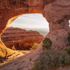 Senior hiker seated in the morning light at Double Arch, Arches National Park, Utah.
2015; Adult; Adults Only; Arches National Park; Contemplation; Desert; Devil's Garden - Arches National Park; Eroded; Hiking; Horizontal; Landscape; Male; Males; Men; Moab; Morning; Natural Arch; Nature; Navajo Sandstone; One Man Only; One Person; One Senior Man Only; Only Men; Orange Color; Outdoors; People; Photography; Red; Red Rocks; Rock - Object; Sandstone; Scenics; Senior Adult; Senior Male; Senior Men; Sitting; Southwest USA; Stone Arch; Sunrise - Dawn; Tourism; Tourist; Utah;