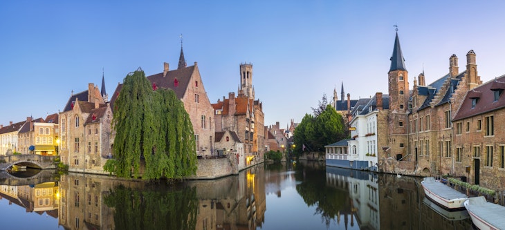 Medieval buildings on Dijver canal, as seen from Rozenhoedkaai.
755649703
Architecture; Belgium; Bruges; Building Exterior; Canal; Clear Sky; Color Image; Day; Dijver; Horizontal; Medieval; No People; Old Town; Outdoors; Panoramic; Photography; Reflection; Reflective; Rozenhoedkaai; Sunny; Town; West Flanders;