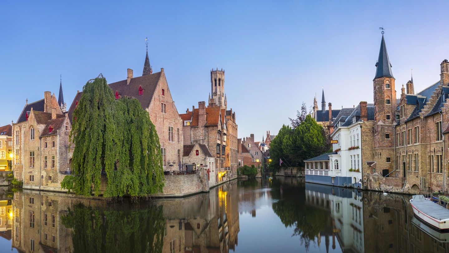 Medieval buildings on Dijver canal, as seen from Rozenhoedkaai.
755649703
Architecture; Belgium; Bruges; Building Exterior; Canal; Clear Sky; Color Image; Day; Dijver; Horizontal; Medieval; No People; Old Town; Outdoors; Panoramic; Photography; Reflection; Reflective; Rozenhoedkaai; Sunny; Town; West Flanders;
