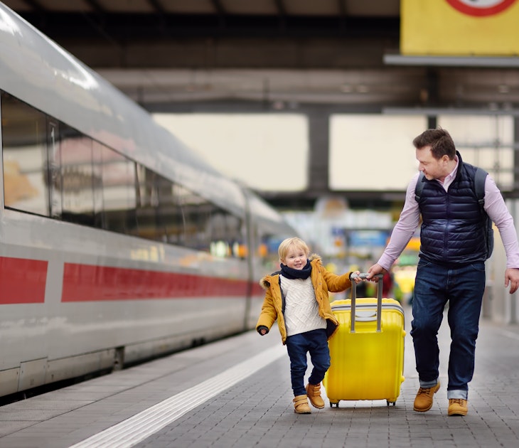 Smiling young boy and his father pulling luggage on a railway station platform.
915878572
Childhood, Leisure Activity, Journey, Baby Boys, Tourism, Caucas, Caucasian Ethnicity, Europe, Station, Rail Transportation, Railroad Station Platform, Lifestyles, Single Father, Transportation, Tourist, Germany, Togetherness, Road, Commuter Train, Happiness, Photography, Father, Part Of, Two People, Concepts, Suitcase, Son, One Parent, Airport, Speed, Family with One Child, Men, Child, Waiting, People, Baby - Human Age, Horizontal, Small, Bag, Adult, Vacations, Outdoors, Electric Train, Passenger, Toothy Smile, Facial Expression, Family, Males, Parent, Travel