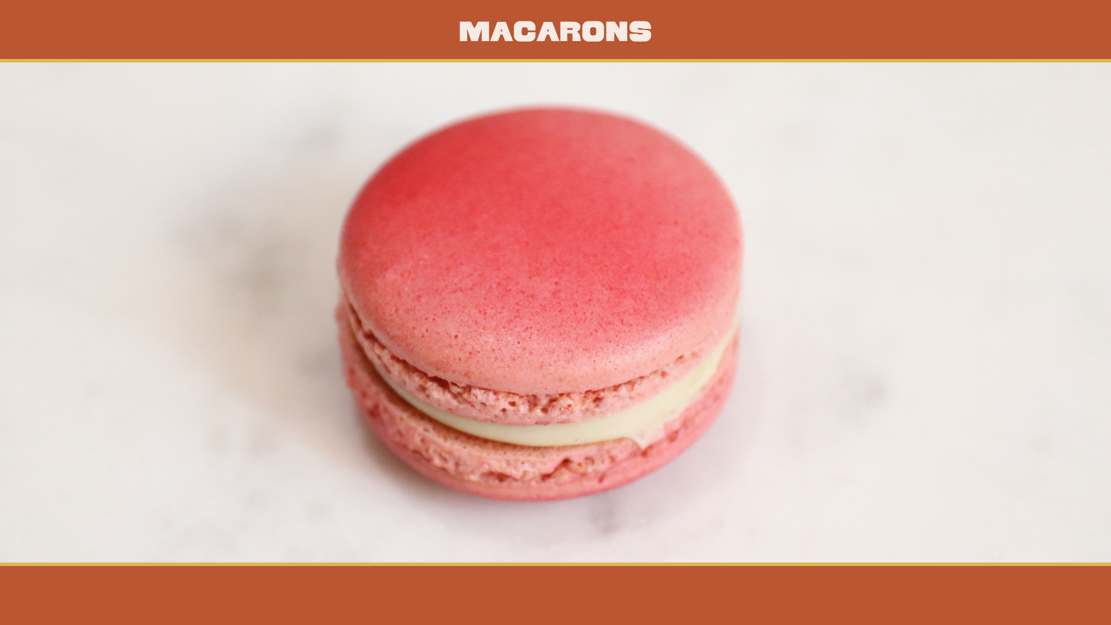 Up-close shot of a pink macaron