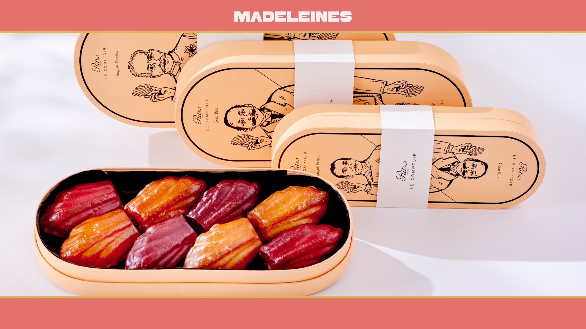 A box of flavored Madeilines presented in a wooden box