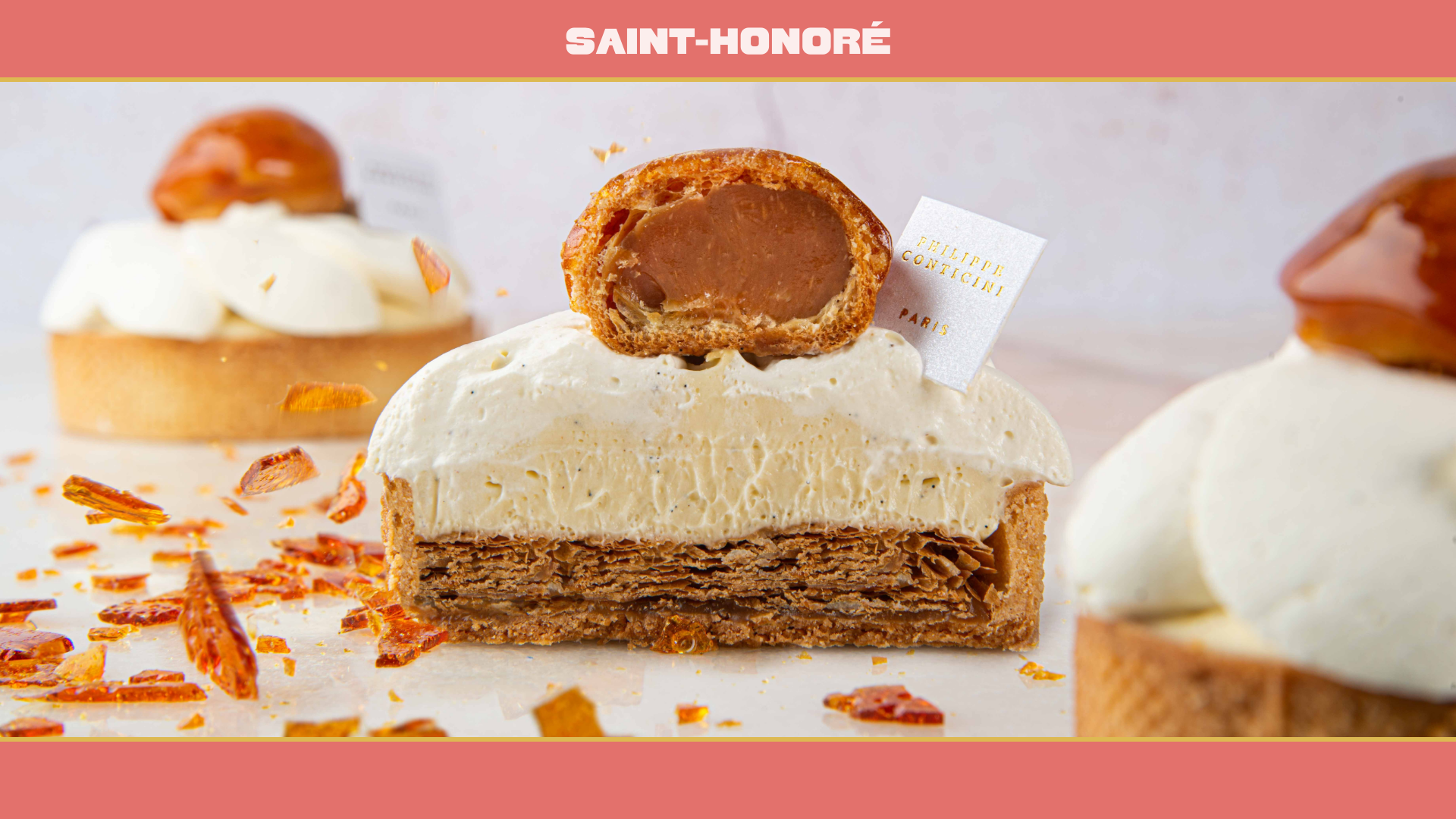 Saint Honore pastry split in half to showcase its goey caramel center and cream topping