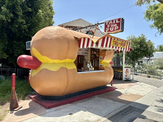Hot dog stand Tail o the Pup is in the form of a hot dog, West Hollywood, California, USA