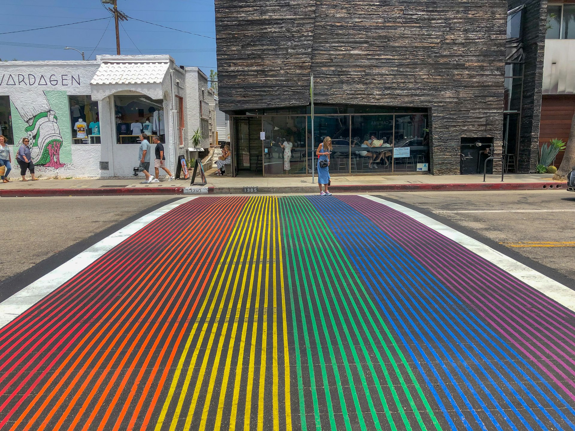 Rainbow gay flag crosswalk in Abbot Kinney Boulevard, Venice, Los Angeles