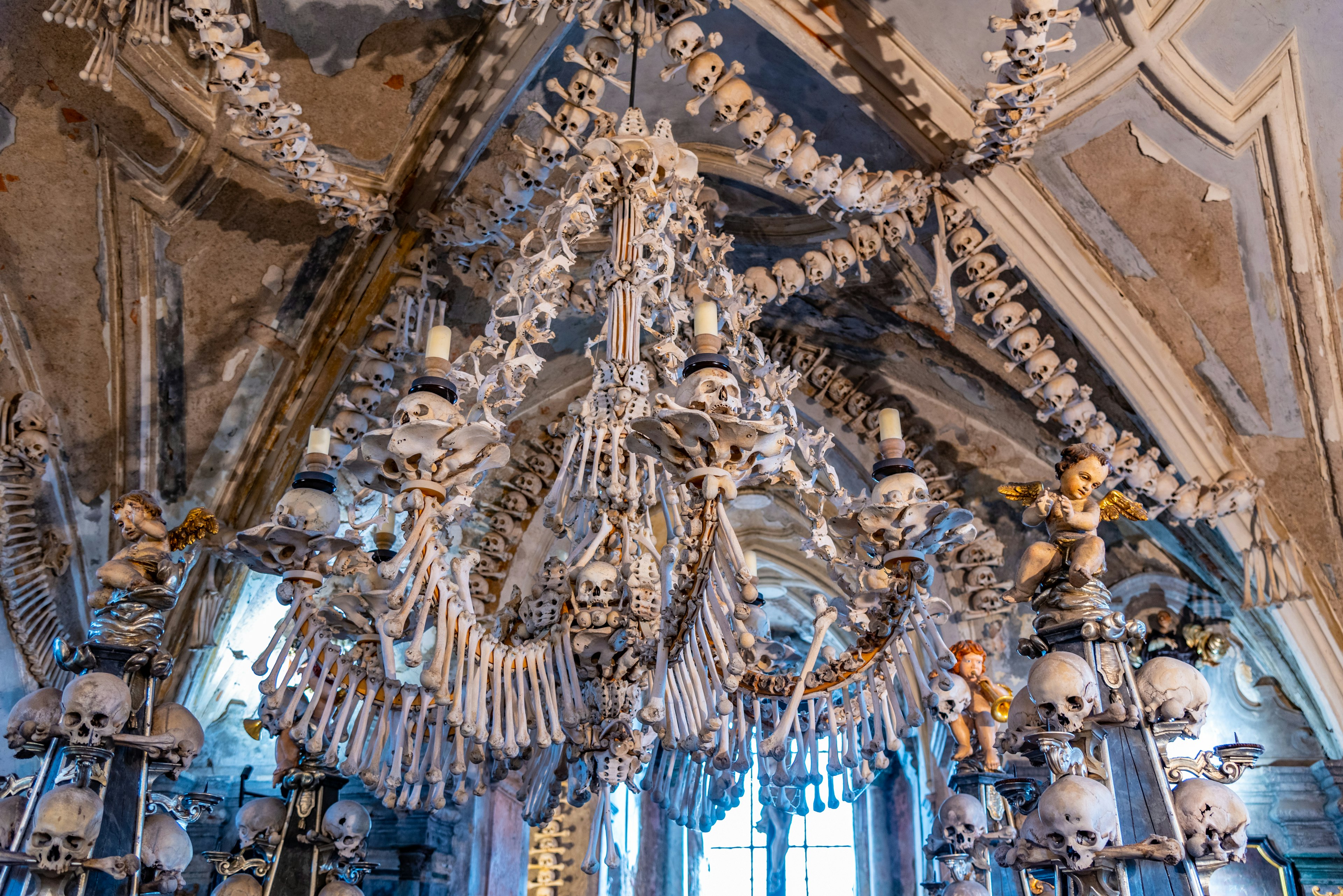 Architectural decorations made from skulls and other bones adorn the interior of a church