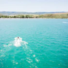 Single boat rides in popular Bear Lake destination in northern Utah; Shutterstock ID 1593990913; your: Brian Healy; gl: 65050; netsuite: Online Editorial; full: Best beaches in Utah
1593990913
above, aerial, america, beach, bear lake, beautiful, blue, boat, camping, coastline, destination, drone, explore, holiday, idyllic, lake, landscape, park, people, play, popular, recreation, remote, rv park, sand, sandy, scenery, scenic, seaside, shallow, shore, site, speed boat, summer, swim, tourism, travel, utah, vacation, view, water, nature, outdoors, lagoon, sea, panoramic, swimming, land