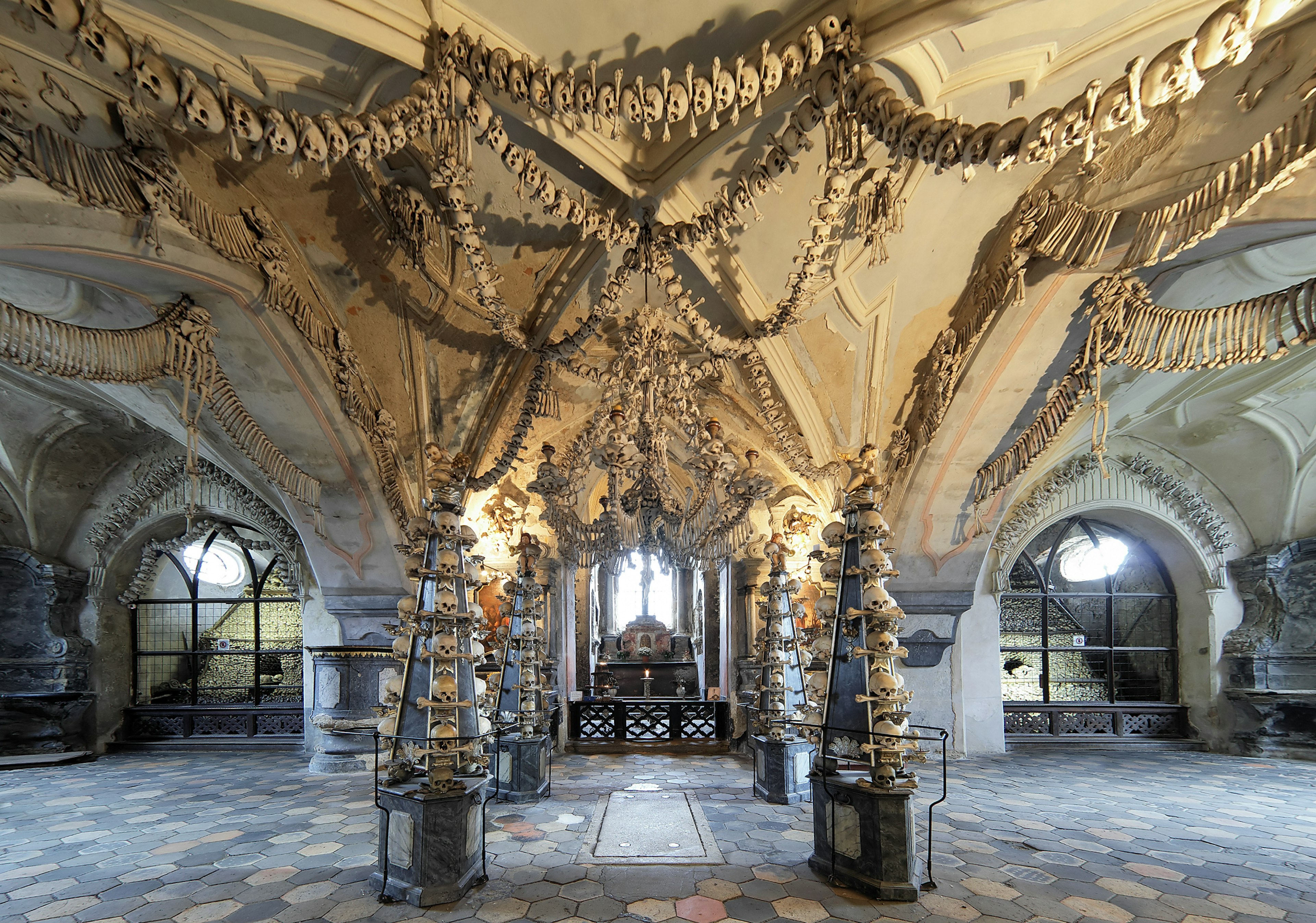 Interior of the Sedlec ossuary (Kostnice) decorated with skulls and bones.