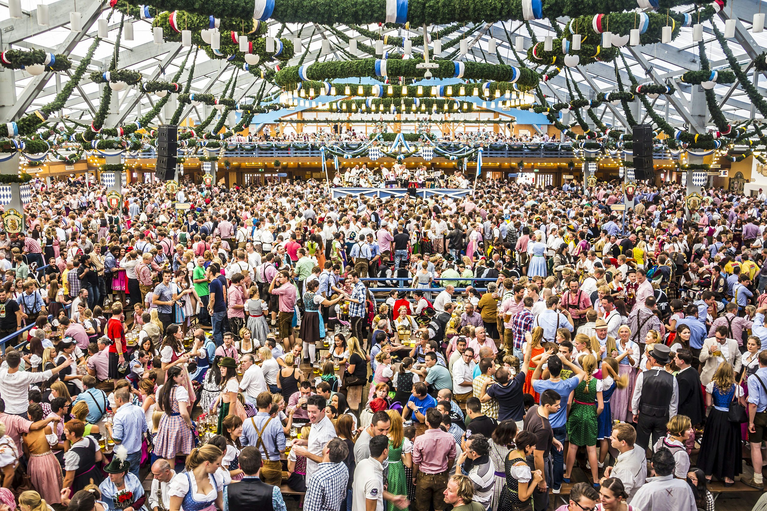 Oktoberfest, Munich: Overview over the big beer tent. In the background is the band.