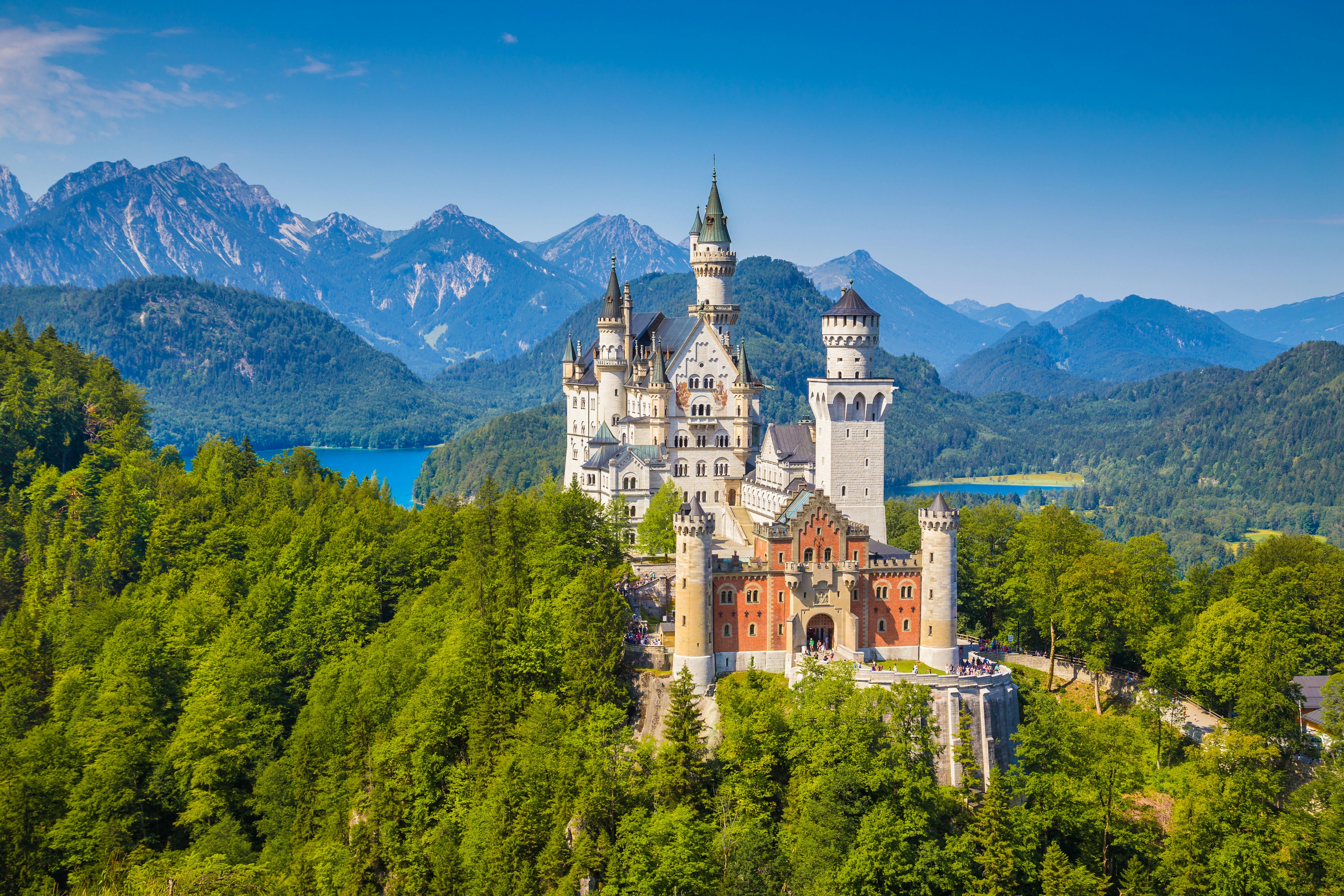 Beautiful view of world-famous Neuschwanstein Castle, the 19th century Romanesque Revival palace built for King Ludwig II, with scenic mountain landscape near Fussen, southwest Bavaria, Germany