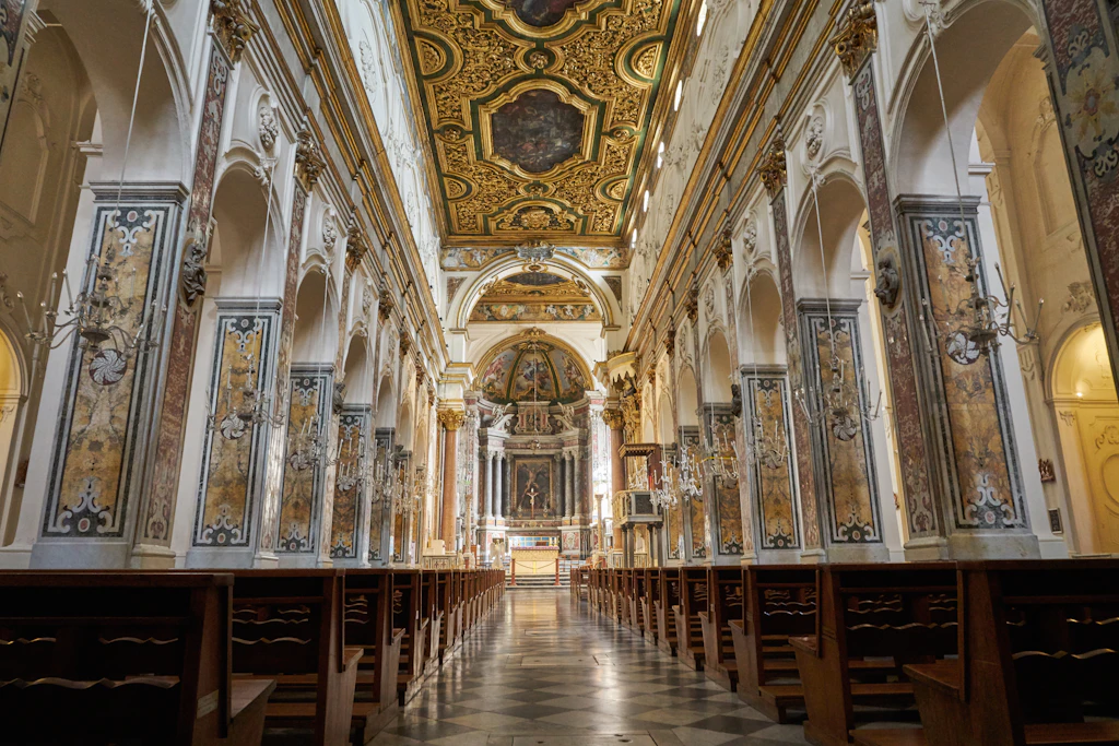 shutterstockeditorial488588086.jpg Interior view of the Duomo di Amalfi's gold-accented basilica