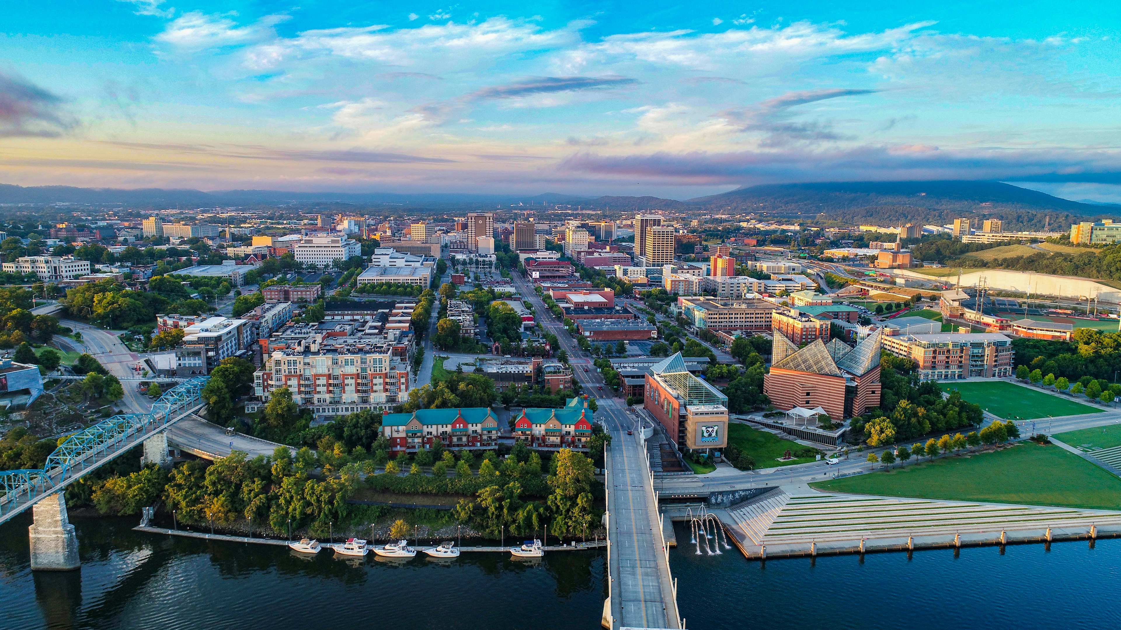 Drone Aerial of Downtown Chattanooga TN Skyline, Coolidge Park and Market Street Bridge