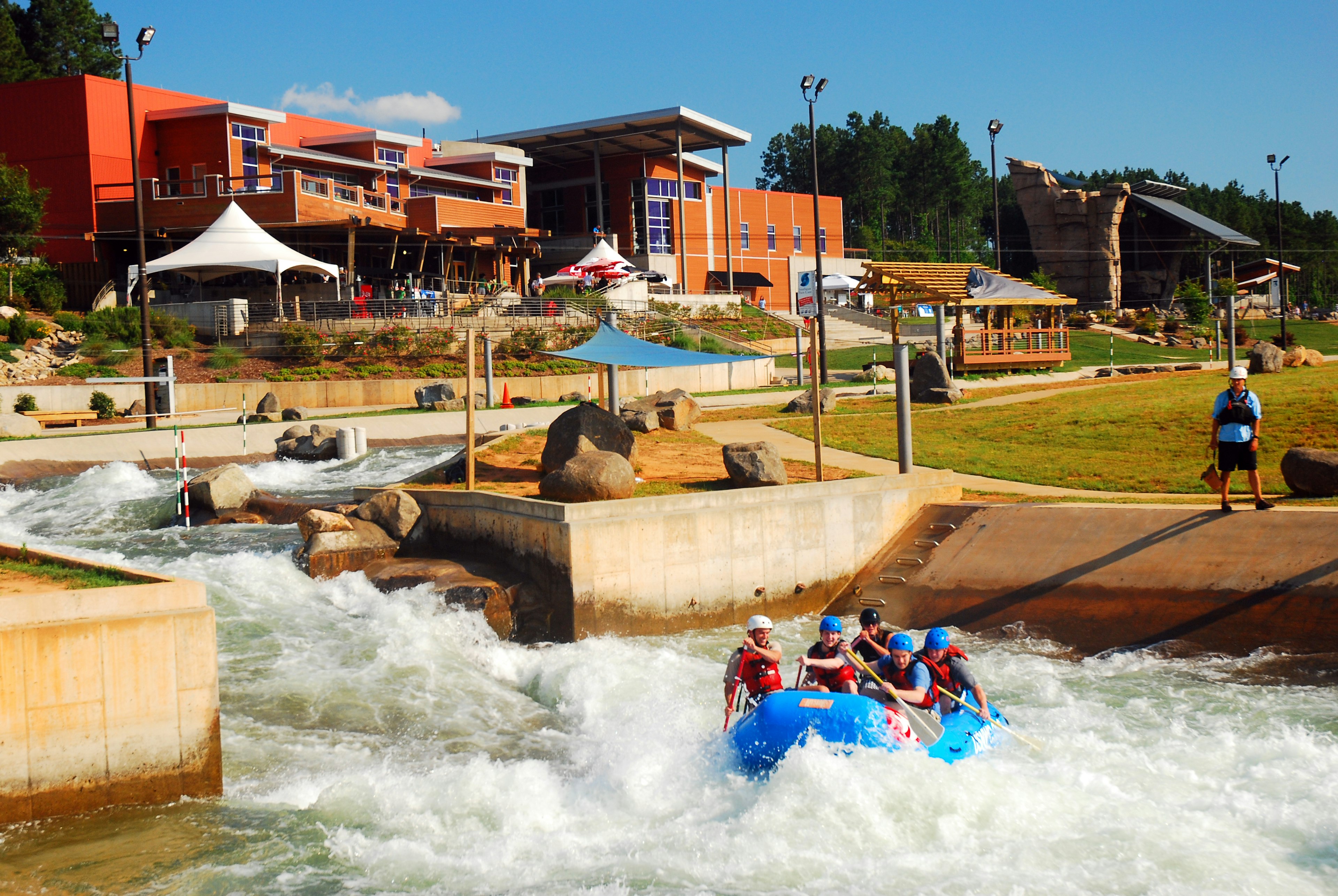 White water rafting at a water sports center on a sunny day