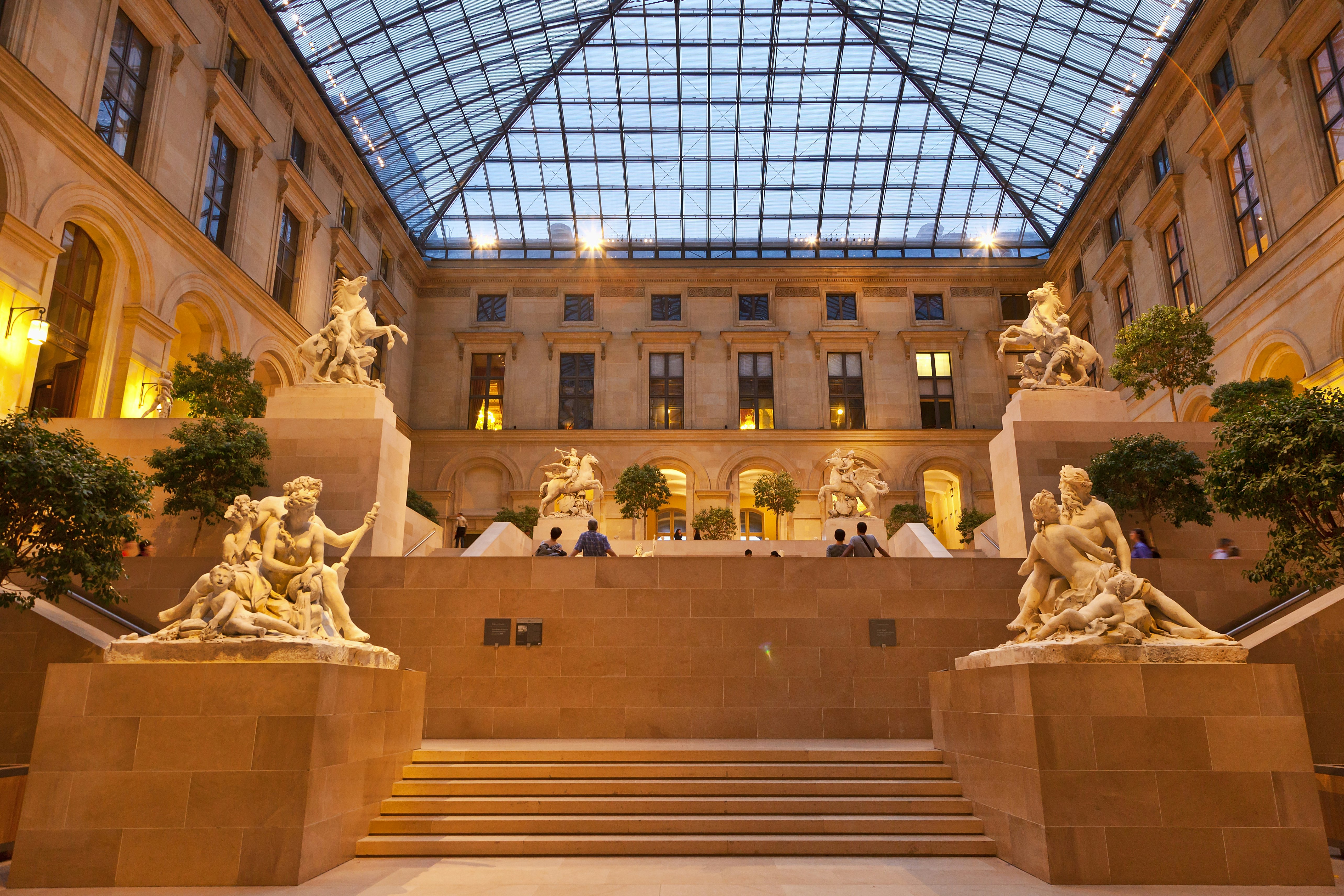 Sculptures in the Marly Court of the Louvre museum. The atrium cover and renovation of the courtyard was designed by I.M. Pei.