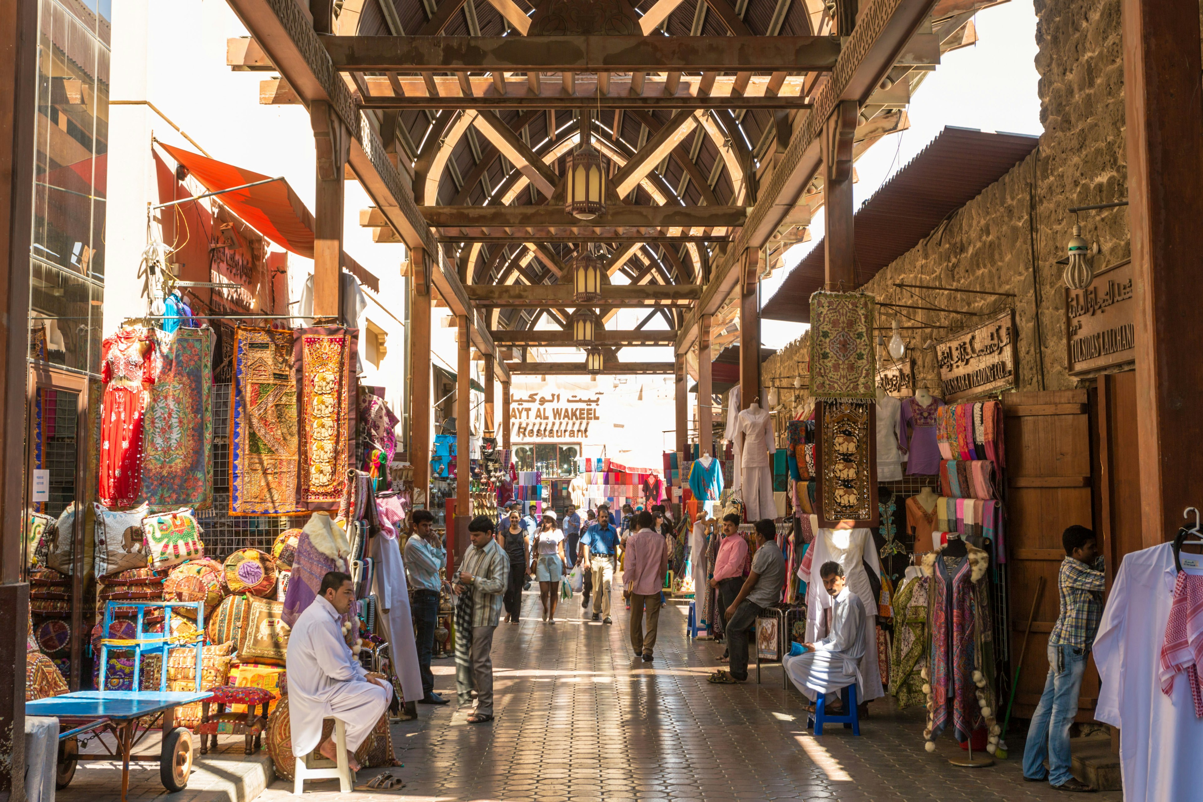 Textile souk crowded with people at daytime, Bur Dubai, Dubai, United Arab Emirates