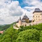 May 26, 2016: Exterior of Karlstein Castle, a large Gothic castle founded in 1348 by King Charles IV.
539854124
Surrounding Wall, Building Exterior, Czech Culture, Stone Material, Gothic Style, Medieval, History, The Past, Old, Famous Place, Architecture, Outdoors, Bohemia, Czech Republic, Europe, Tree, Springtime, Mountain, Hill, Forest, Landscape, Sky, Wall - Building Feature, Castle, Monument, Fort, Tower, karlstein, Karlštejn, Stronghold, Karlstein, Photography, Horizontal, Karltejn, Karlstejn, Bohemia - Czech Republic, No People