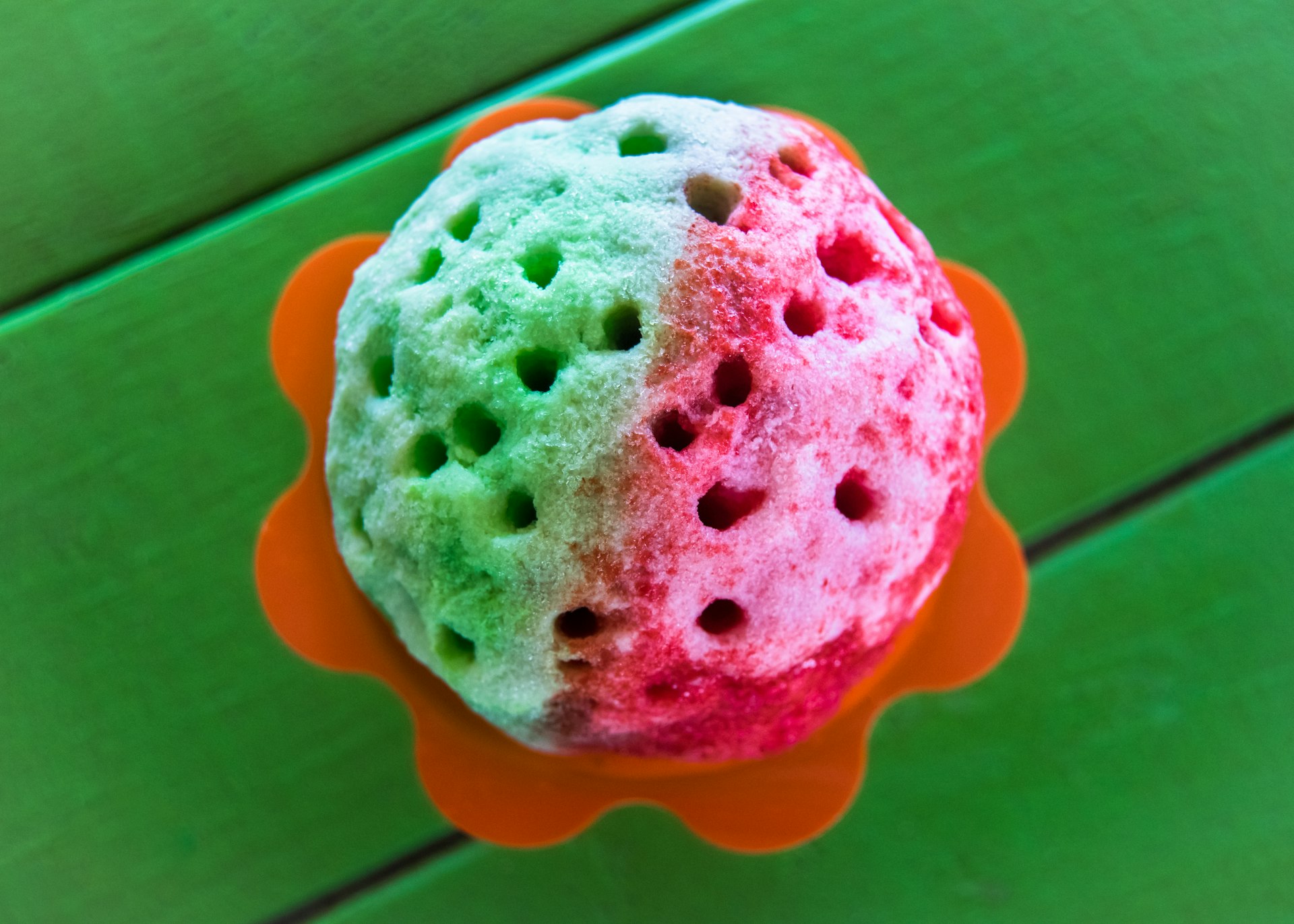 Red and Green Shave Ice in Bowl ©Photo by Meredith Narrowe/Getty Images
