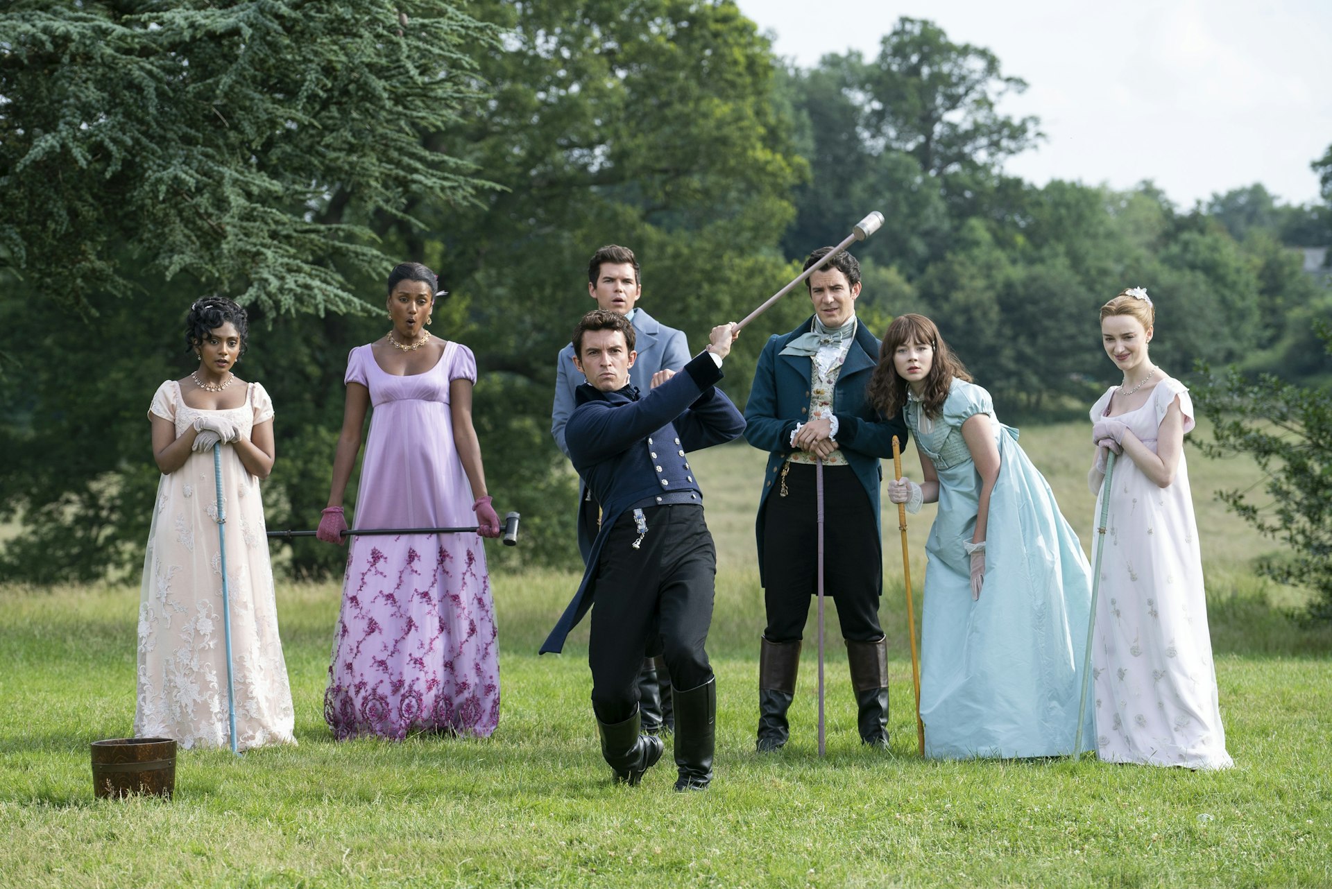 Bridgerton. (L to R) Charithra Chandran as Edwina Sharma, Simone Ashley as Kate Sharma, Luke Newton as Colin Bridgerton, Luke Thompson as Benedict Bridgerton, Jonathan Bailey as Anthony Bridgerton, Claudia Jessie as Eloise Bridgerton, Phoebe Dyvenor as Daphne Basset in episode 203 of Bridgerton. 