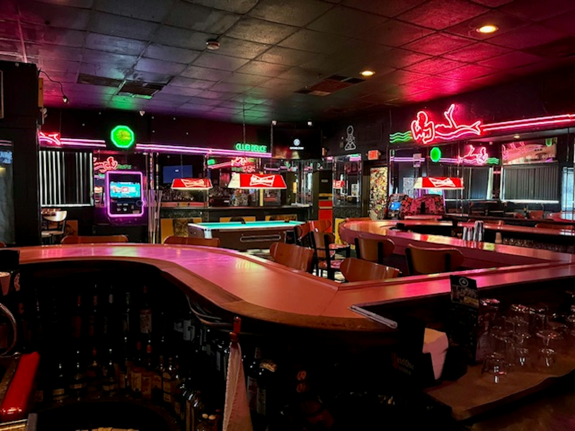 Interior of Mac's Club Deuce, shot from behind the bar