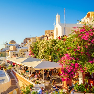 Terrace with view and amazing panorama from roof in Oia- a coastal town on the northwestern tip of Santorini, a Greek Aegean island. The town has whitewashed houses carved into the rugged clifftops
1807657177