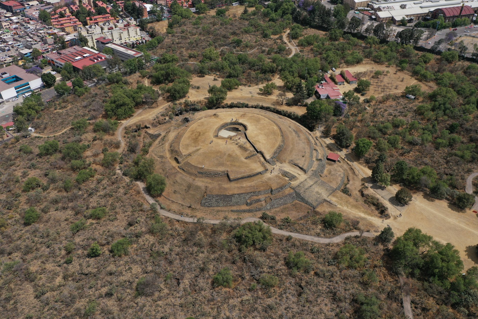 An aerial view of the Cuicuilco Pyramid in Mexico City, Mexico
