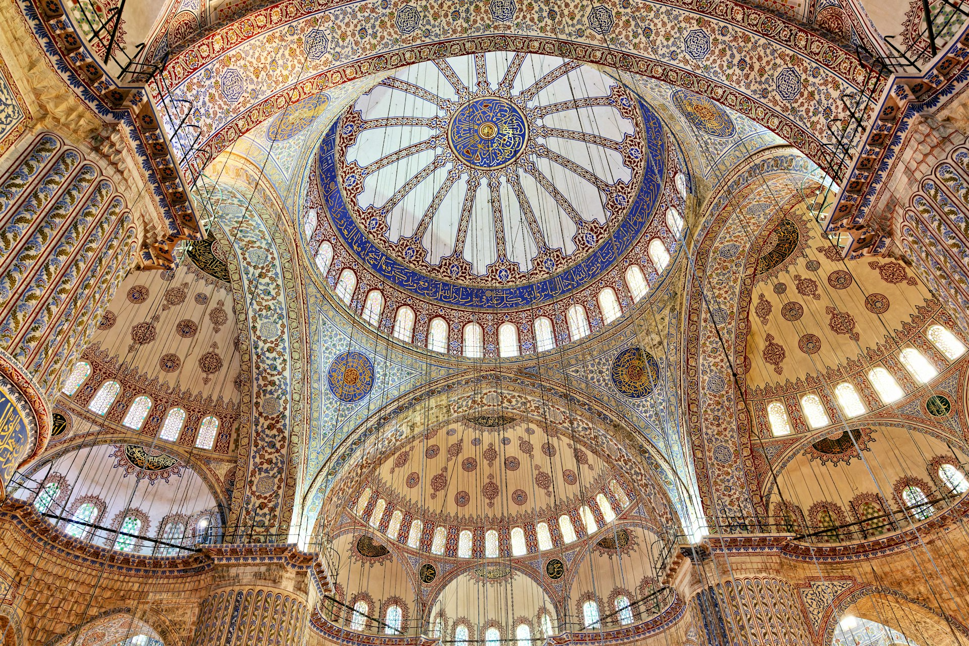 The domed ceiling inside the Sultan Ahmed Mosque (Blue Mosque), which is covered in thousands of İznik tiles.