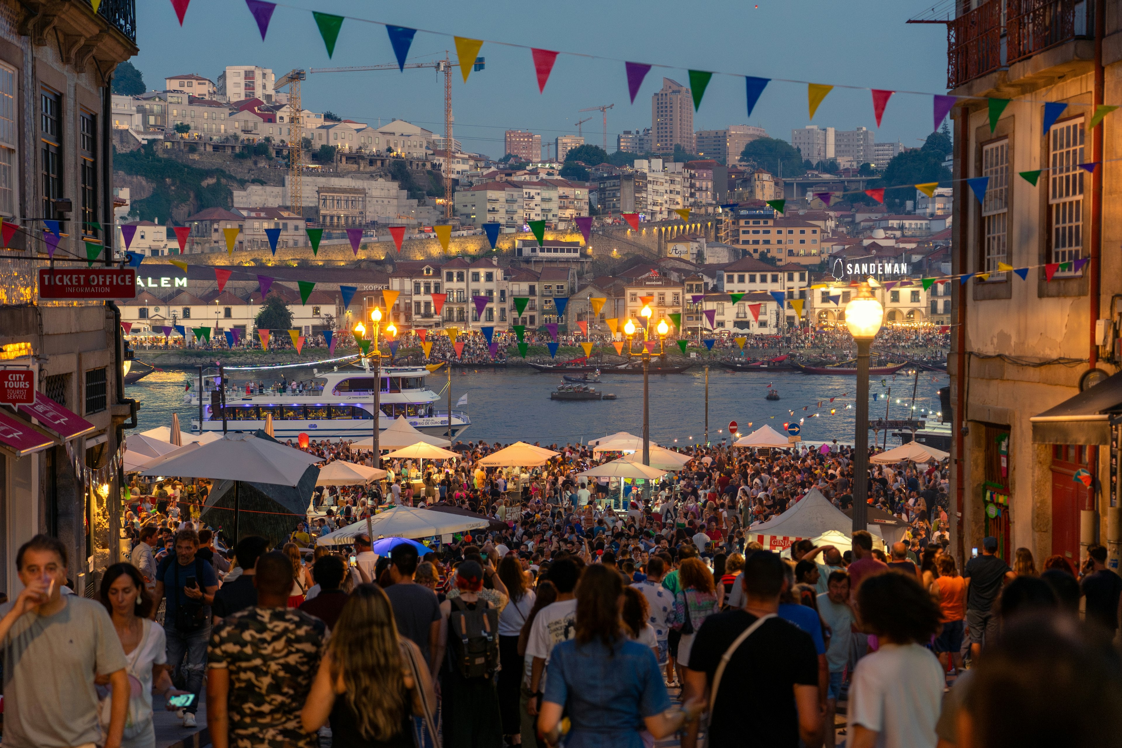 People in the streets during a festival, Ribeira neighborhood, Porto, Portugal