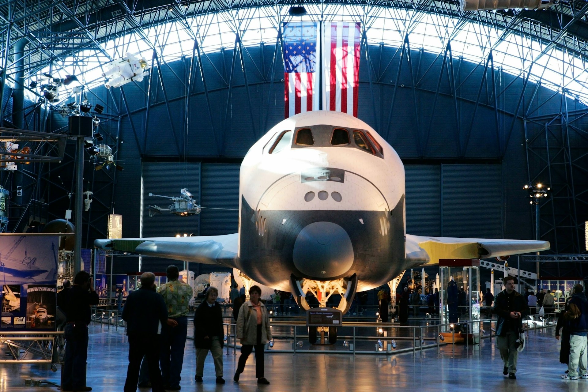 The Space Shuttle Enterprise space ship sits inside a showroom at the National Air and Space Museum.