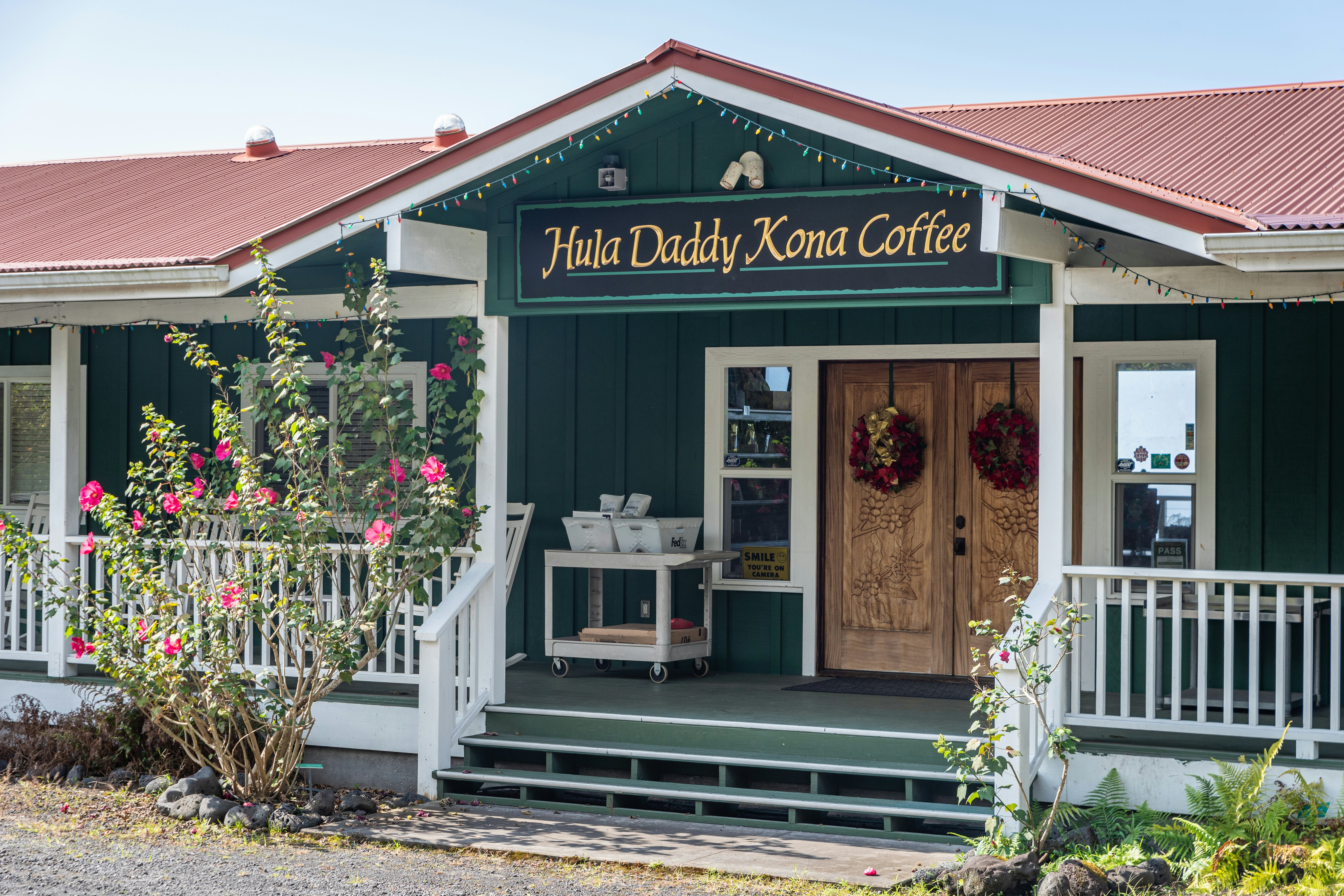 A photo of the entrance at the Hula Daddy coffee plantation shop