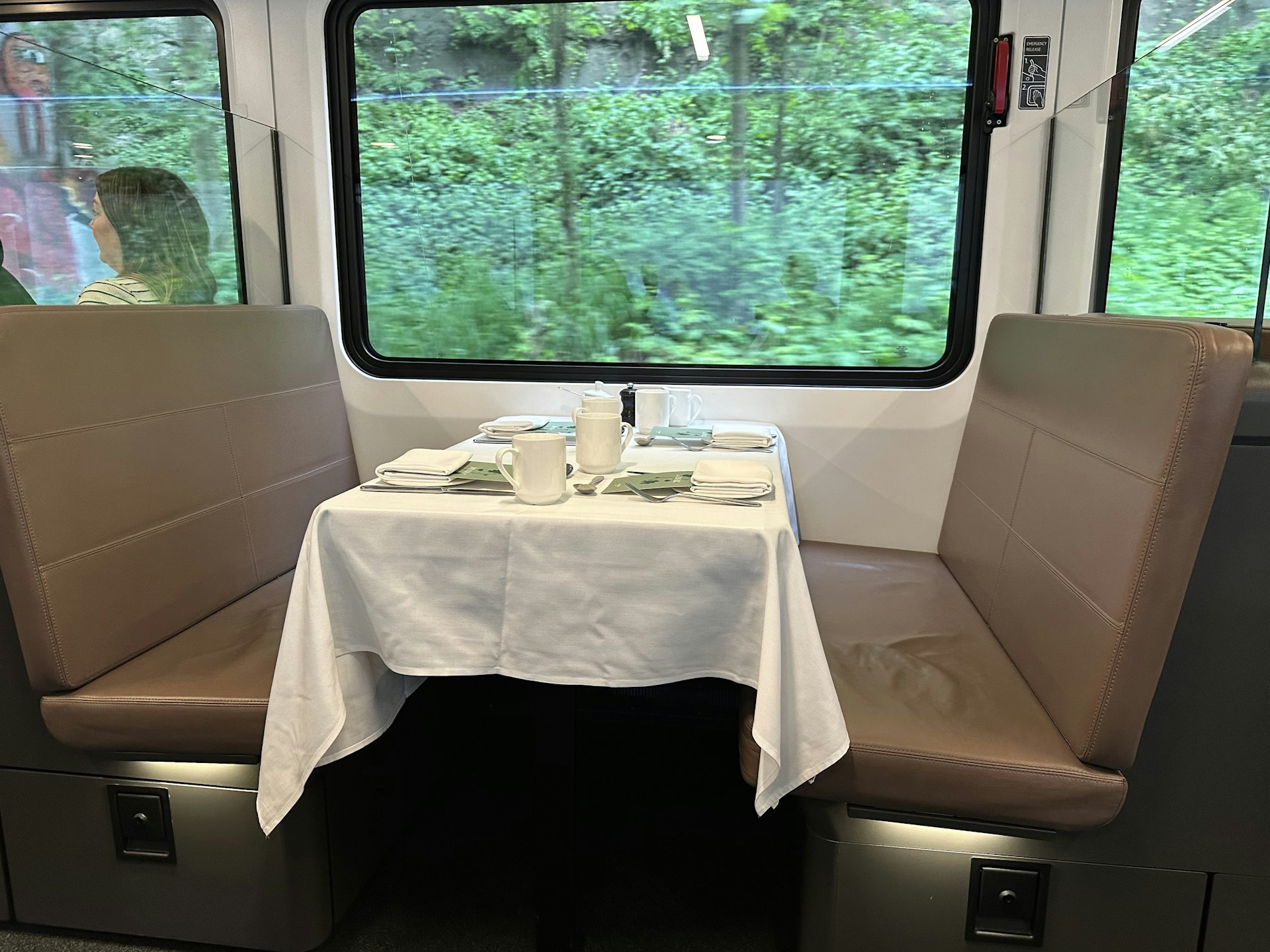 A dining carriage table, with comfortable leather-covered benches