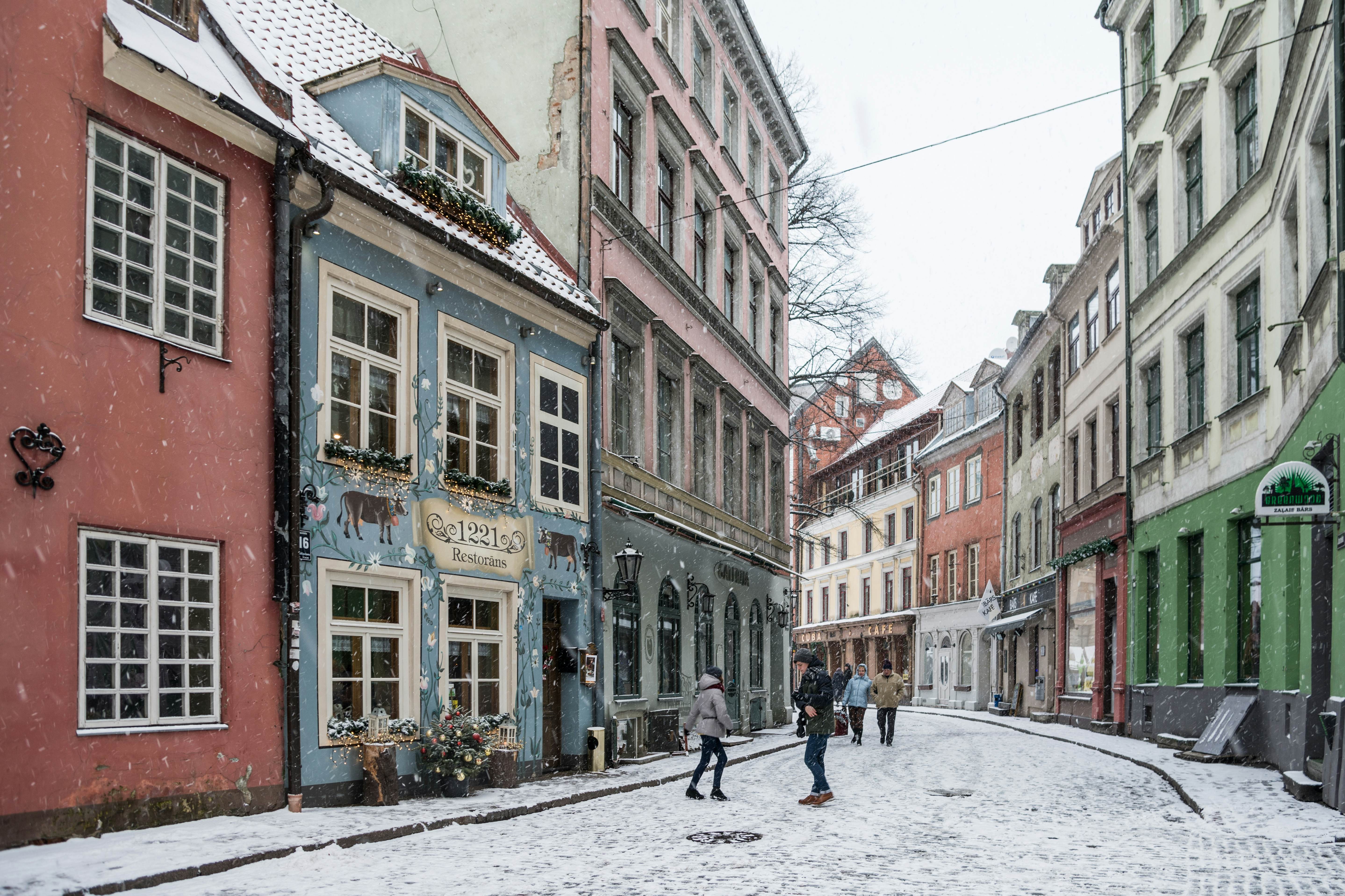 A snow-covered street in the old town of Riga, Latvia.