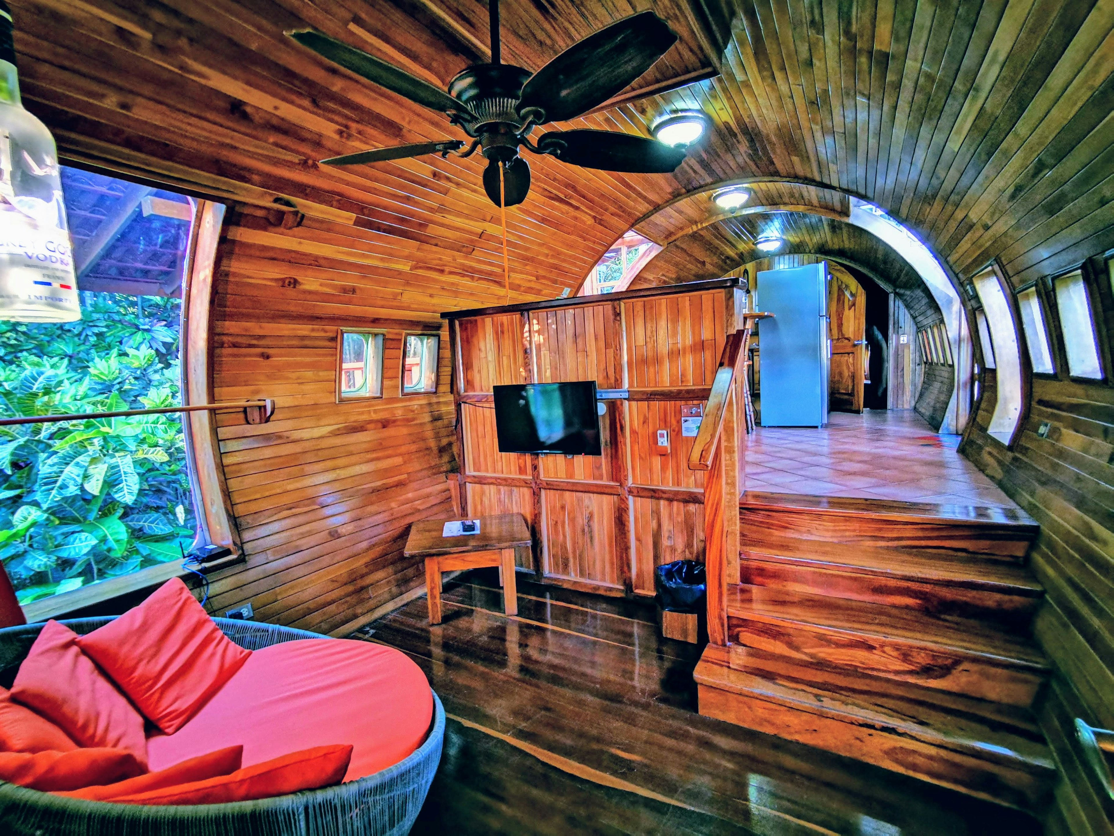 A teak-lined room at 727 Fuselage Home