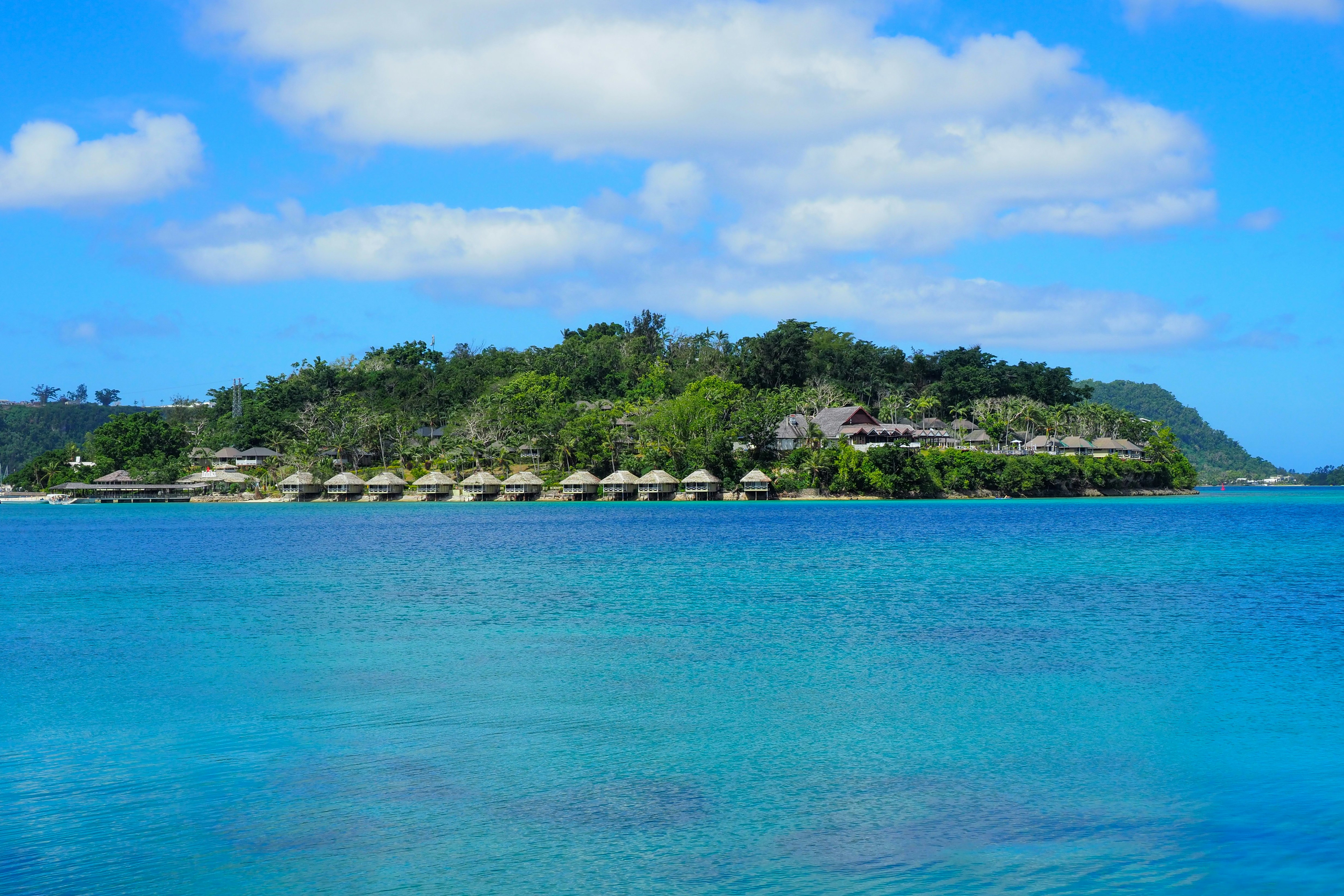 Small buildings along Port Vila's harbour, as viewed from the water