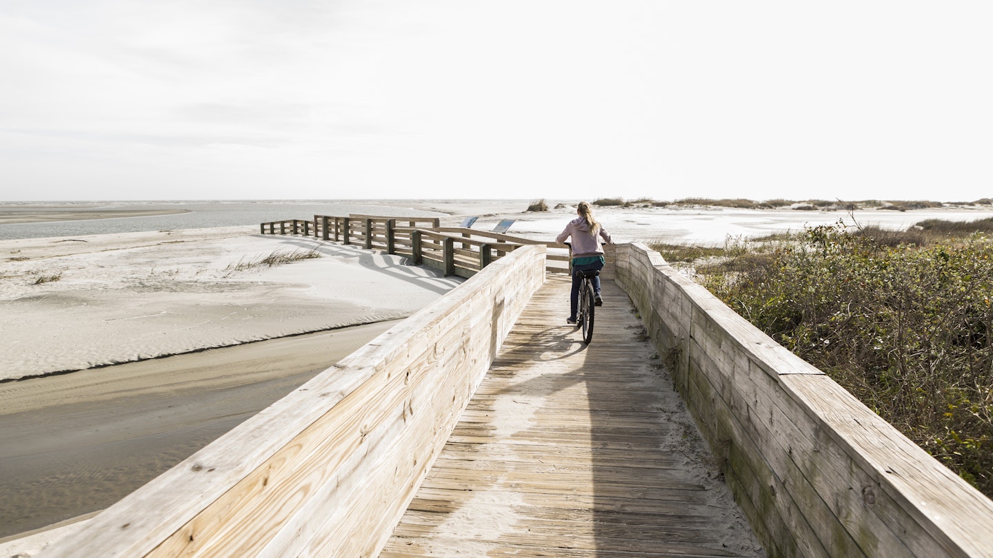 teen girl on her bike crossing bridge to the beach, St. Simon's Island, Georgia
1212071071
boy, cycle, encounter with nature, georgia, leisure, male, sandy beach, walkway, wood
Girl biking on boardwalk on Jekyll Island