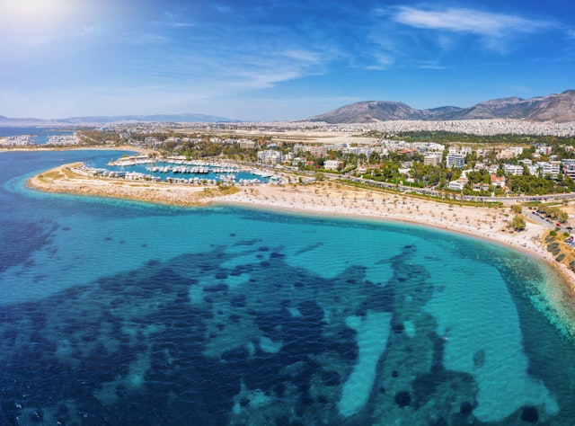 Aerial view to the beach of Glyfada, part of the south Athens riviera with yacht marinas and turquoise sea, Greece