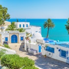 498116298
Built Structure Town Village City Cityscape Architecture Travel Destinations Horizontal Outdoors House Africa Tunisia Plant Formal Garden Street Restaurant Cafe Famous Place Cultures Hill Mountain Sea Mediterranean Sea Scenics - Nature Islam Tunis Sidi Bou Said No People Building Exterior Photography Tourism Arabic Style Medina District Capital Cities Mediterranean Culture 2015 60595 Tunisian Culture Mediterranean Countries
The blue and white village of Sidi Bou Said, looking out to sea in the Gulf of Tunis..