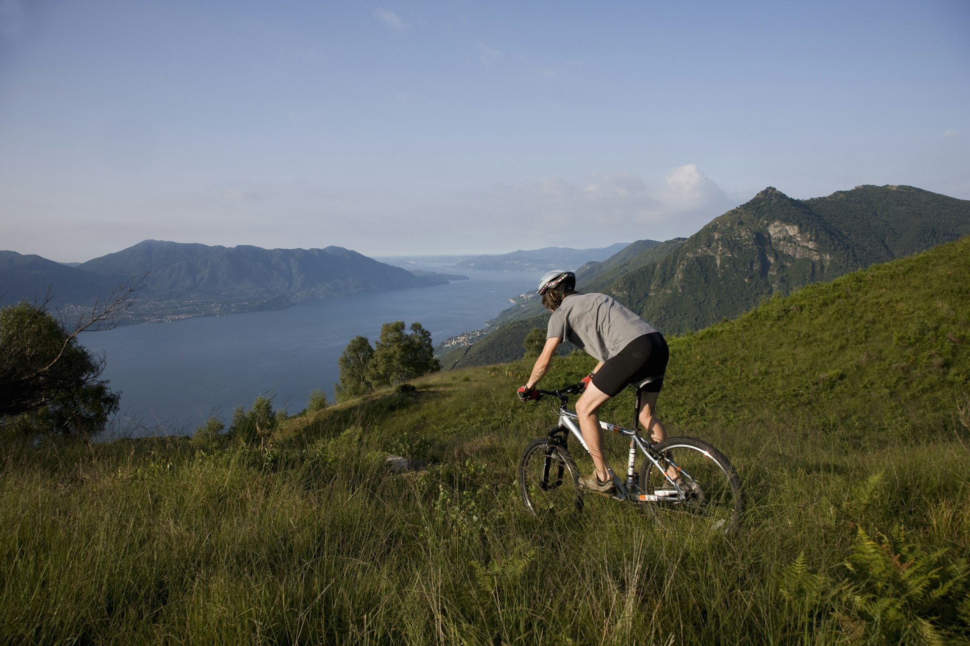 Young man on mountain bike, Lake Maggiore.