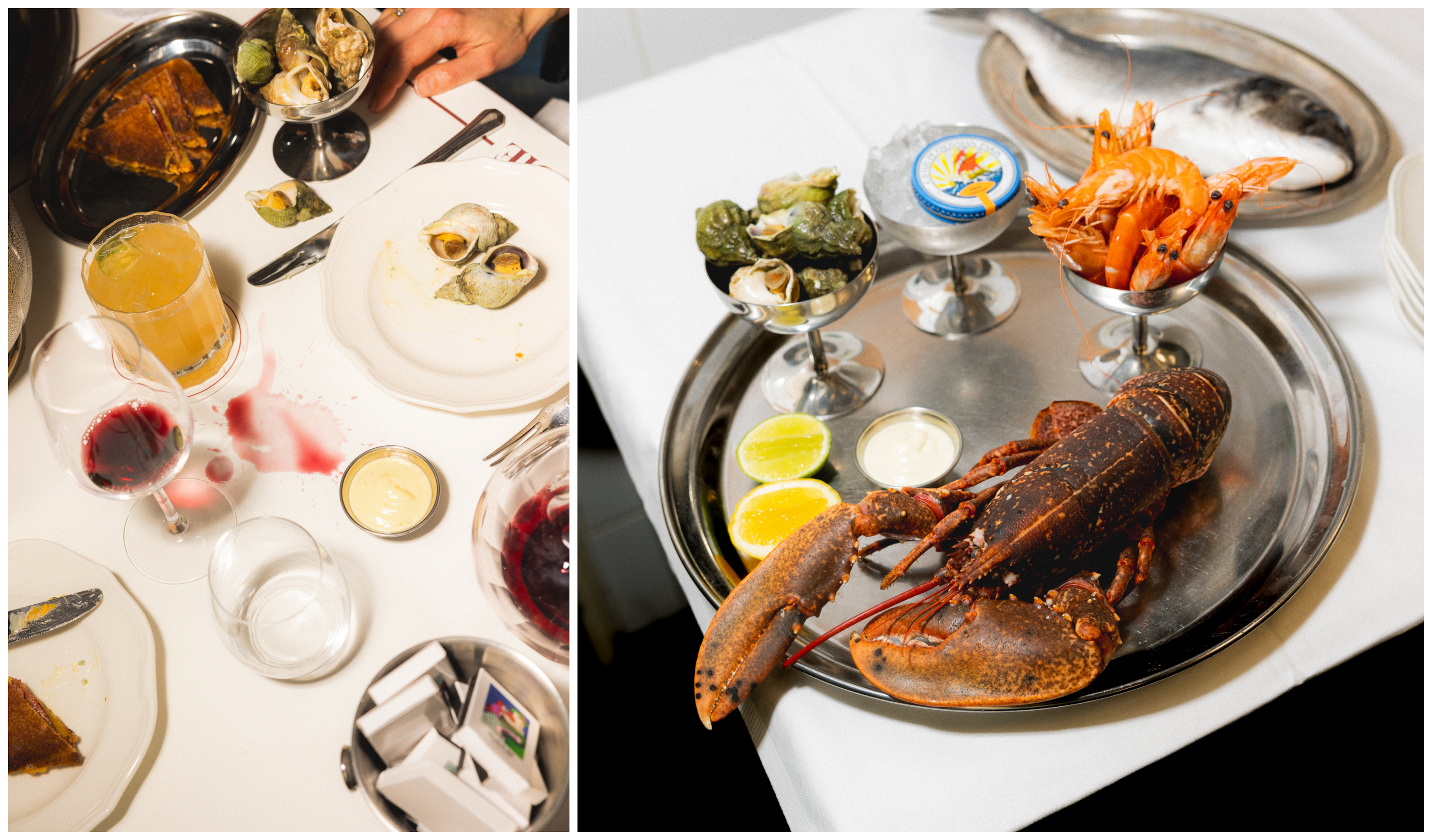 Lobster, tinned fish, wine and lipstick-marked napkins on a white-tablecloth table