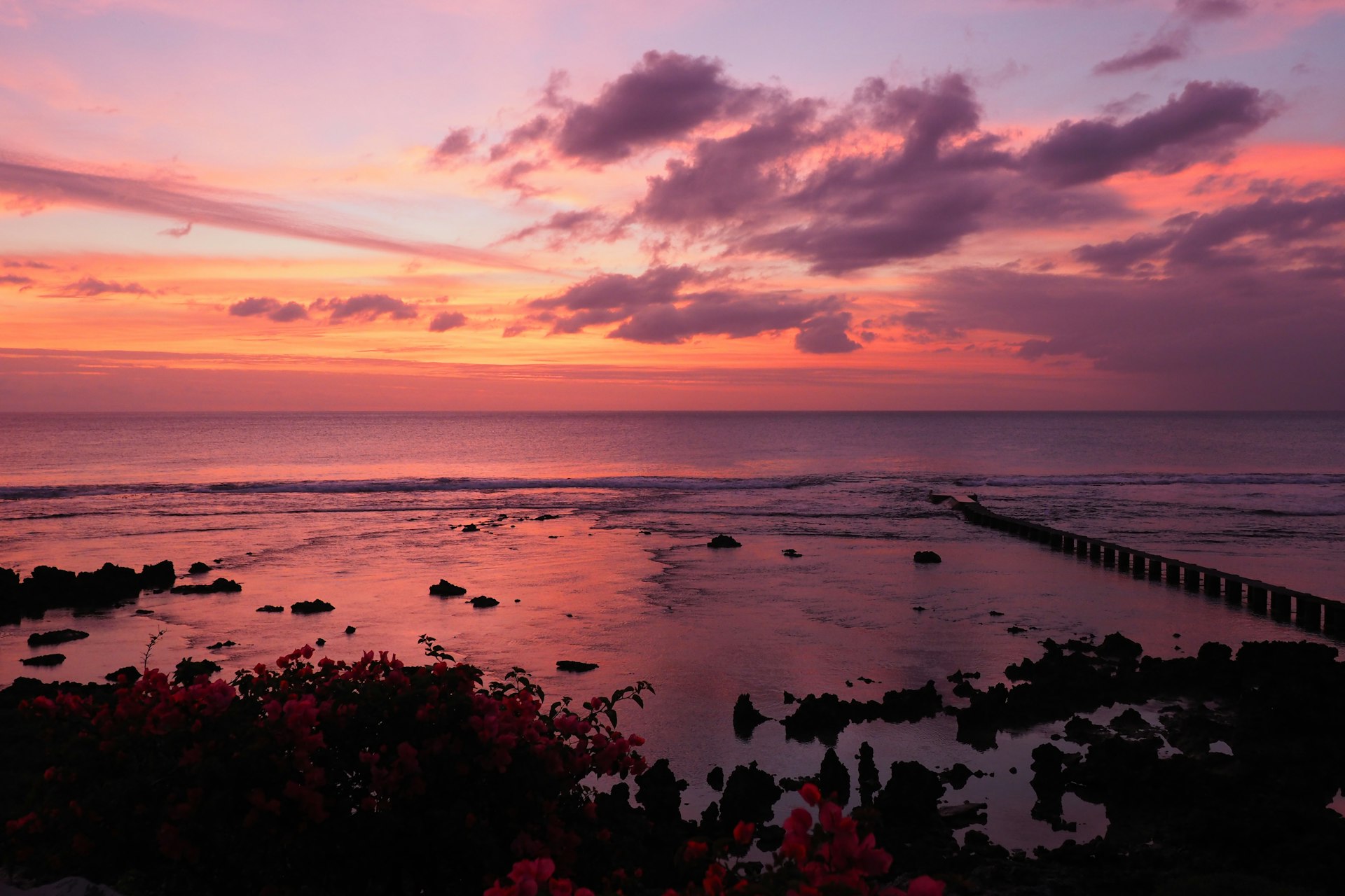 A pink sunset over the ocean in Tanna, Vanuatu