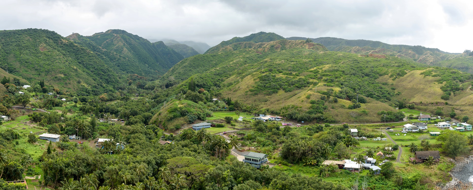 Evening view of a local village on Kahekili Highway at the northeast shore of West Maui, Hawaii, USA