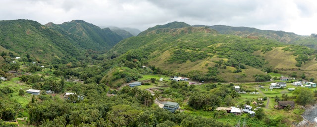 Evening view of a local village on Kahekili Highway at the northeast shore of West Maui, Hawaii, USA