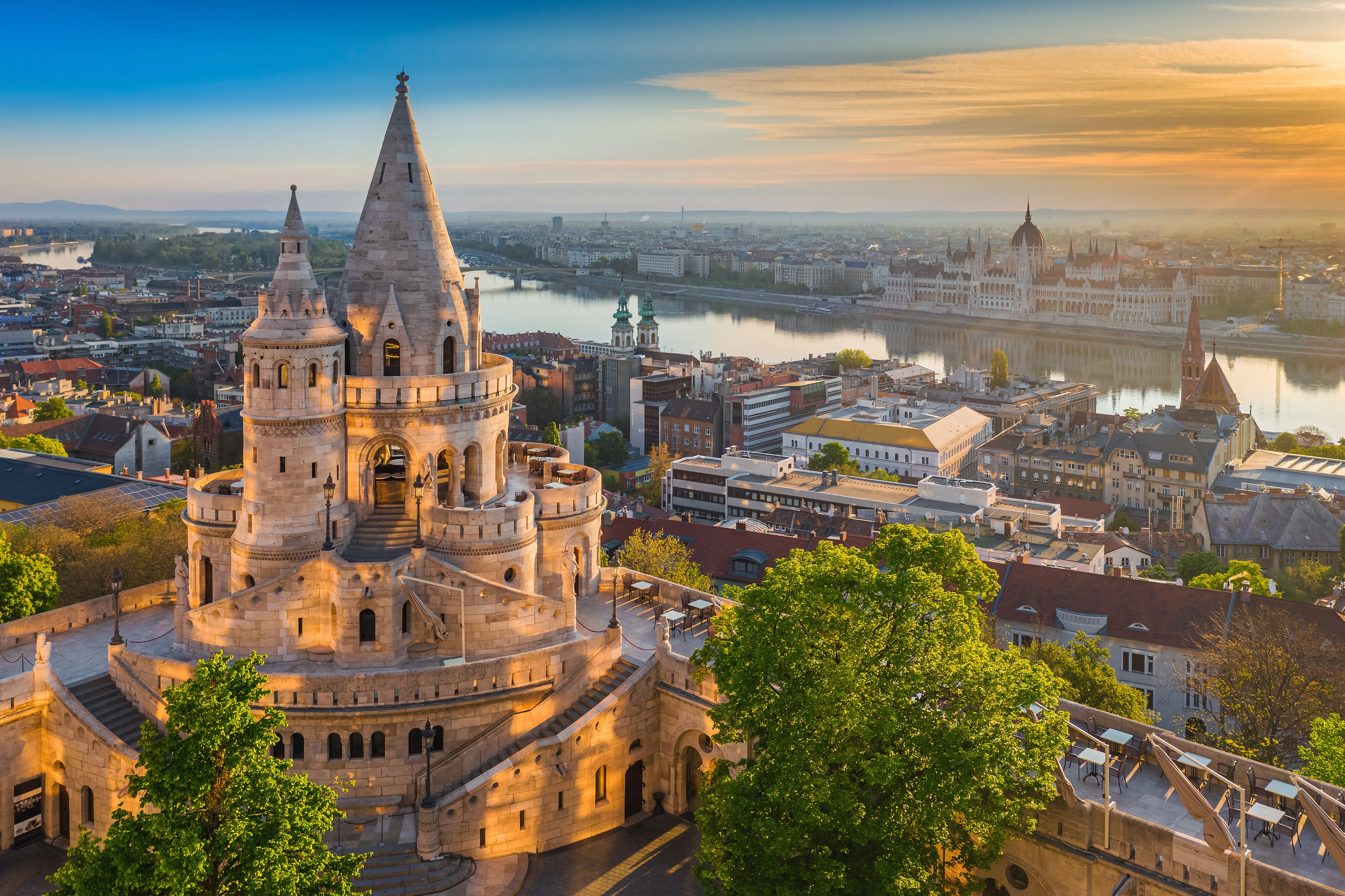 Looking down on Fisherman's Bastion at sunrise, with the Danube beyond