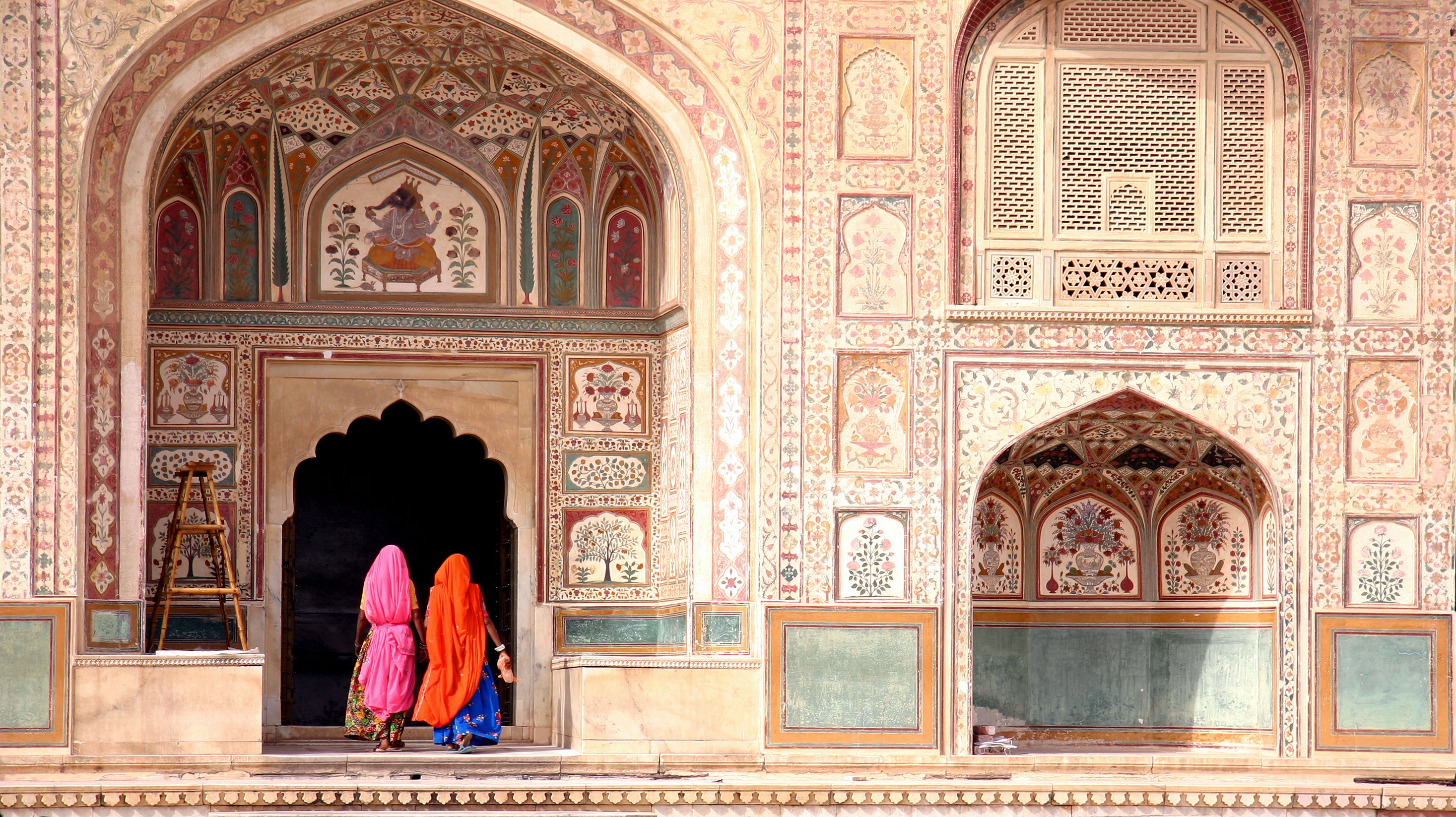 Two women walking in the Amber Fort, Jaipur